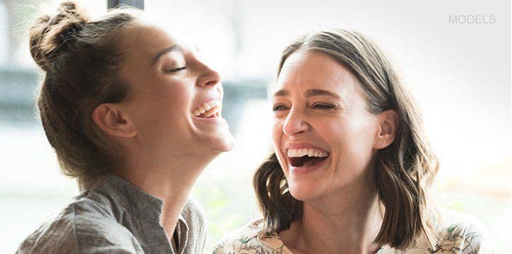 two women laughing