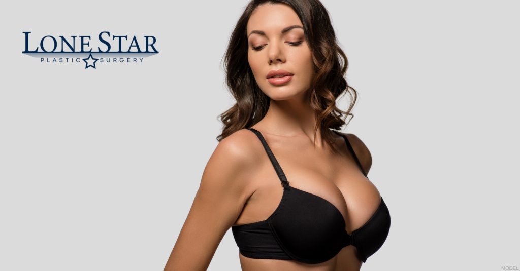 Woman showcasing breast augmentation results (model)