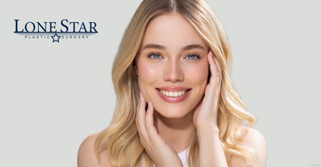 Woman showing laser skin treatment results (model)