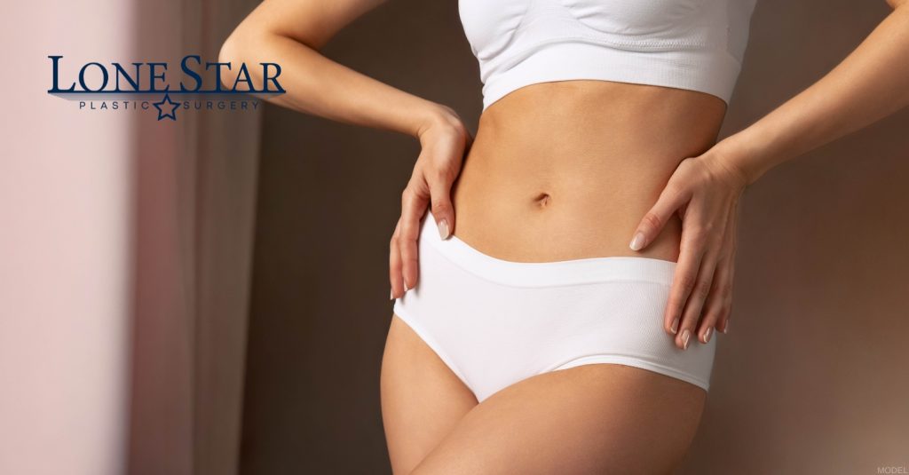 Woman after mommy makeover surgery (model)