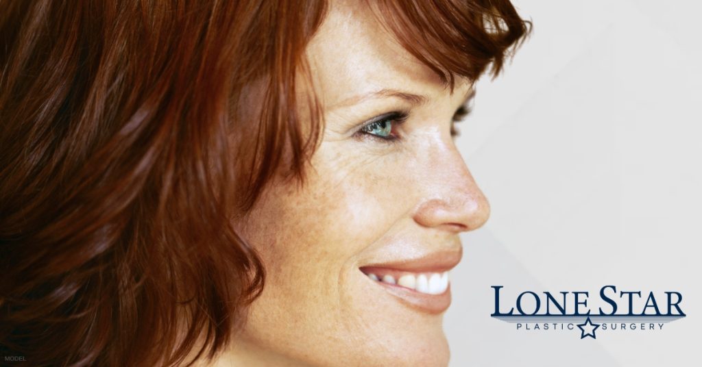 Side profile of smiling woman (model)